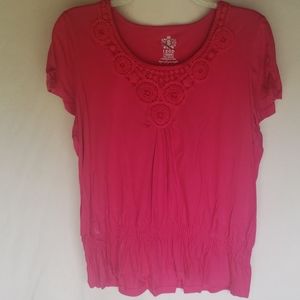 Izod top with elastic near bottom
